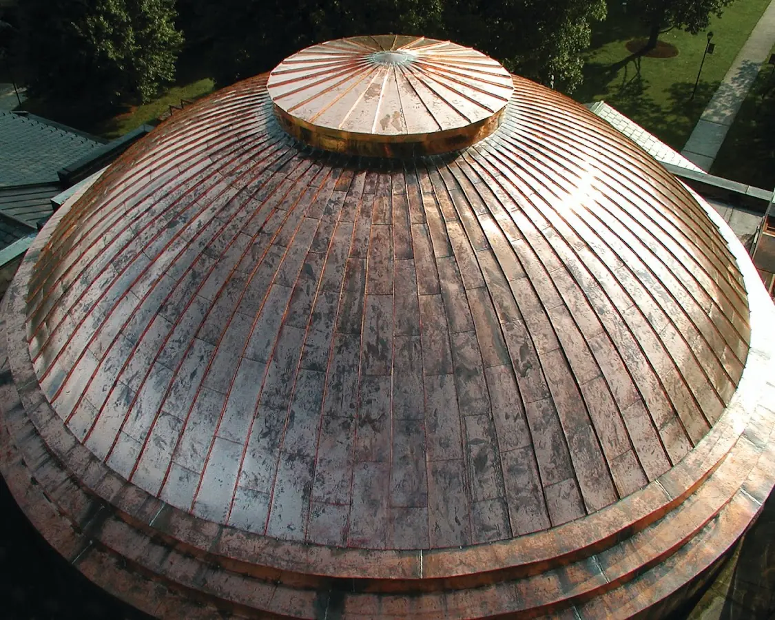 Craftsman Roofing crew installing a new roof in Van Buren